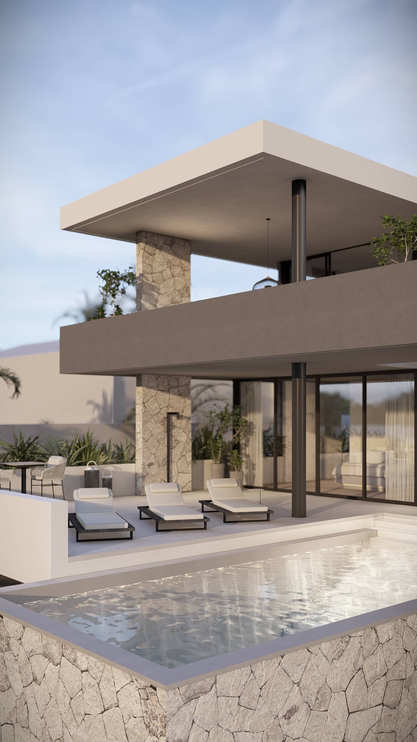 Close-up van een luxe villa met strak dakoverstek, natuurstenen wand, glazen schuifpuien, zwembad en ligbedden.