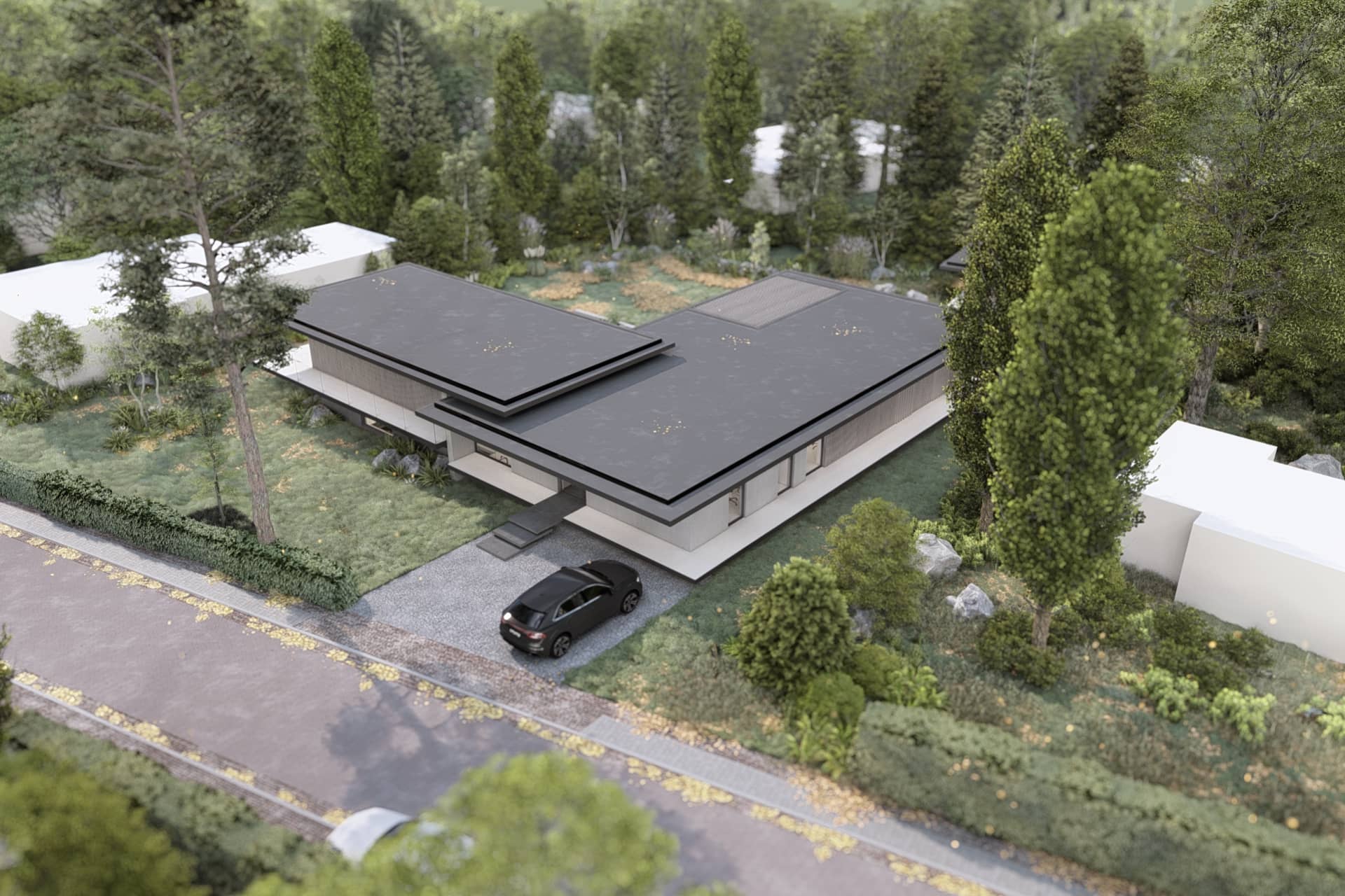 Luchtbeeld van een design bungalow met platte daken, oprit, tuin en groene omgeving.