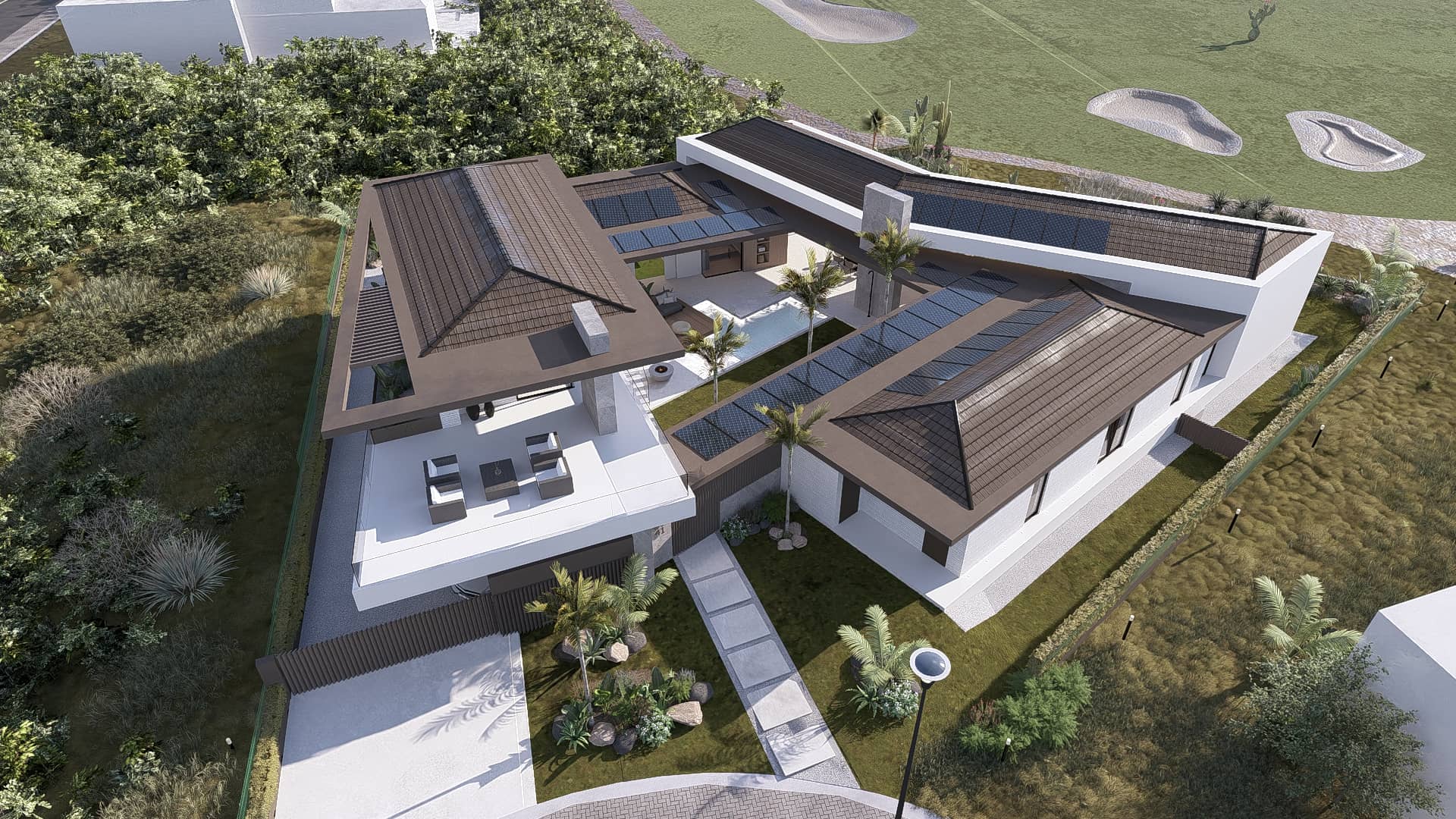 Moderne luxe villa vanuit de lucht met centrale patio, zwembad, overdekte terrassen en zonnepanelen geïntegreerd in de dakvlakken.