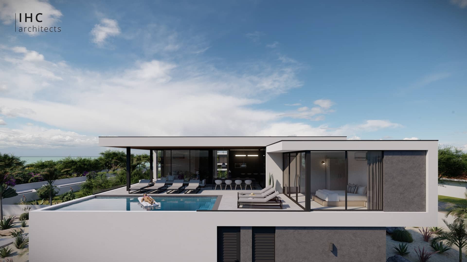 Moderne luxe villa met infinity pool, grote glaspartijen en uitzicht op zee.