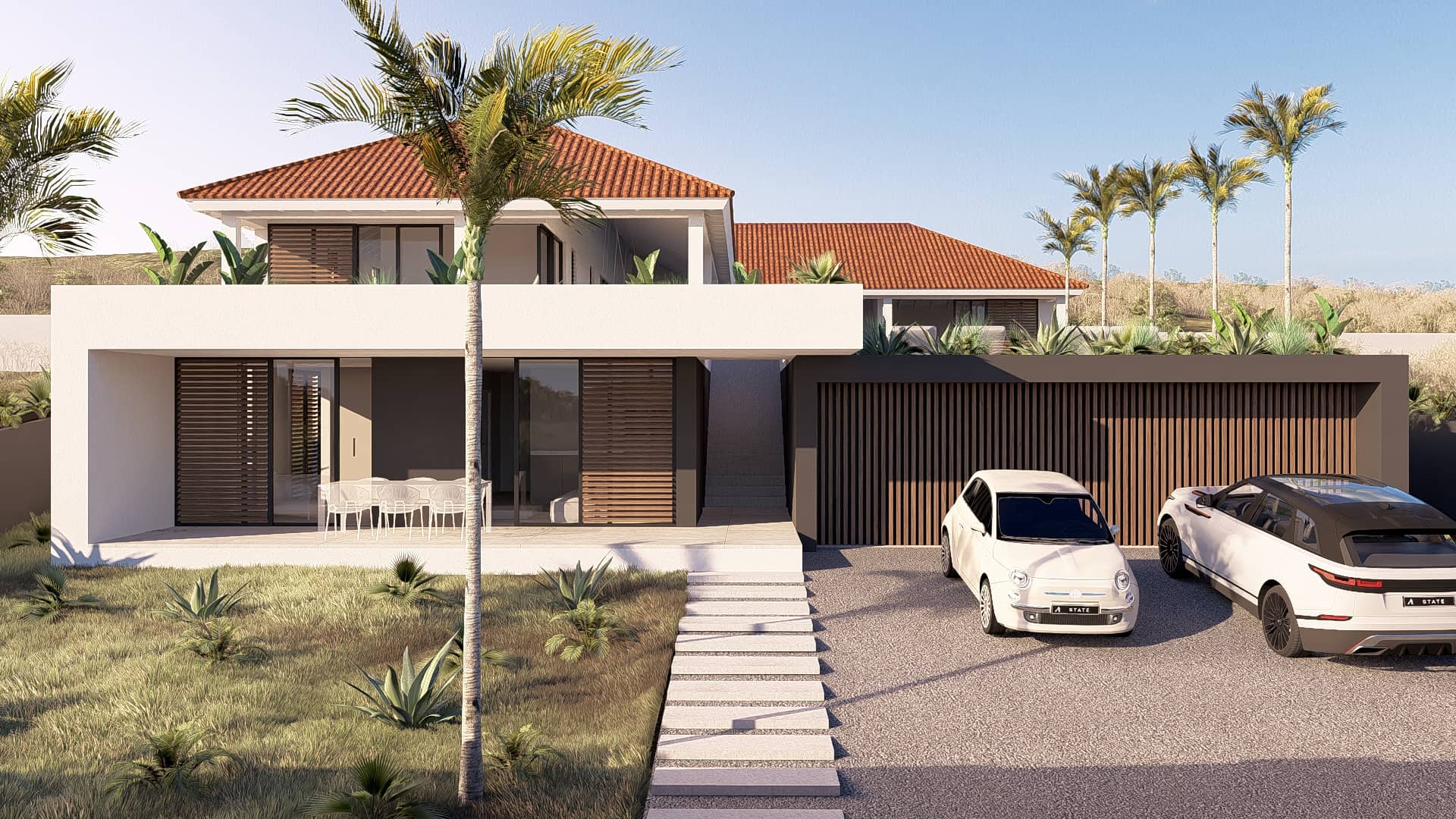 Luxe moderne villa op Curaçao met tropische beplanting, zwembad en terrassen.