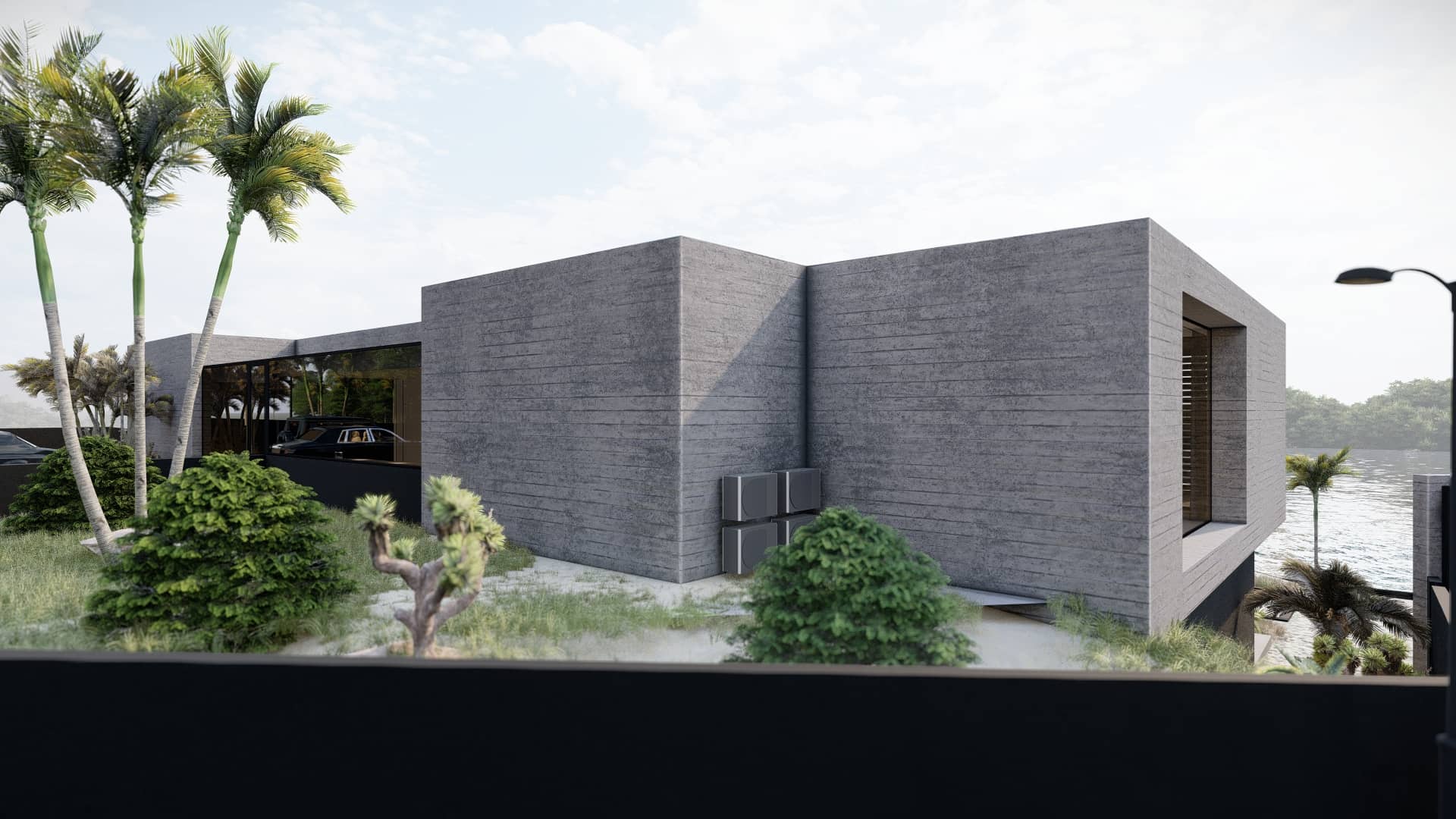 Moderne villa aan het water met grote volumes en minimalistische uitstraling.