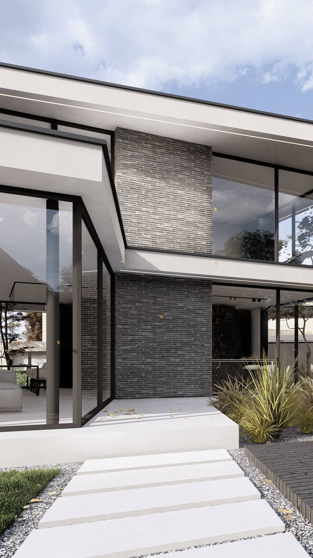 Detail van moderne villa met donkere baksteen, glas en strakke horizontale lijnen