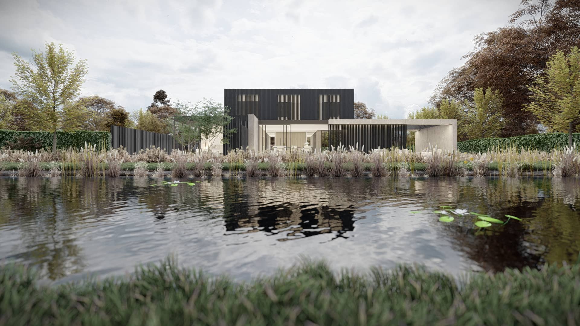 Moderne villa aan het water in Zeeland met open zichtlijnen, grote glaspartijen en een landschappelijke tuin.